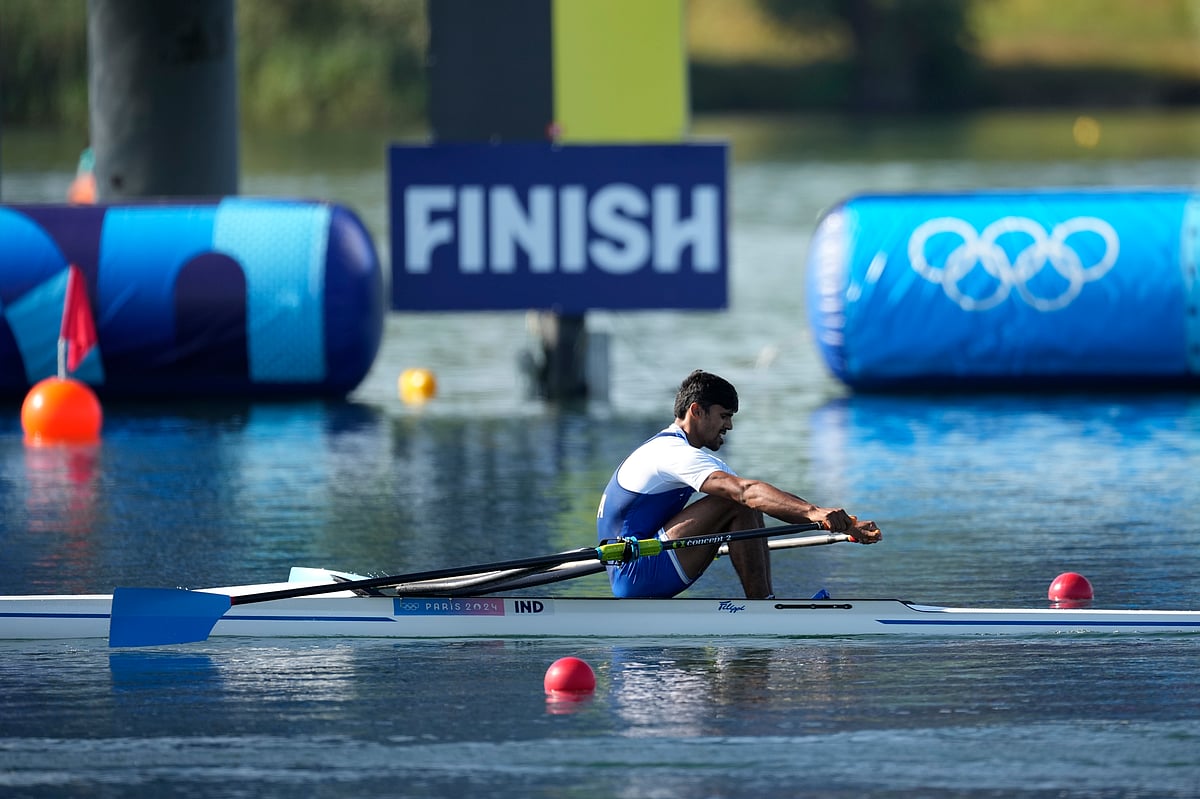  (AP Photo/Ebrahim Noroozi) : Balraj Panwar, of India, competes in the men's single scull rowing repechage at the 2024 Summer Olympics, Sunday, July 28, 2024, in Vaires-sur-Marne, France.